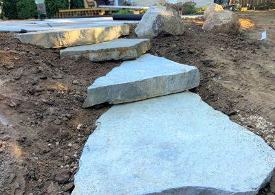 A set of newly installed stone stairs
