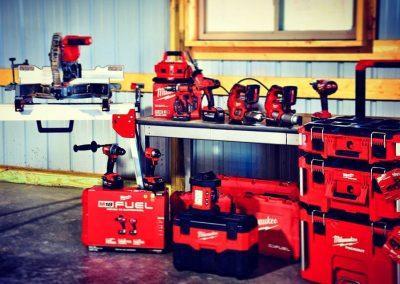 A garage full of equipment that Black Brook employees use during landscaping services